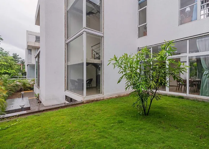 Sierra Skies: Mountain-View Villa with Rooftop Pool & Gym Lonavala