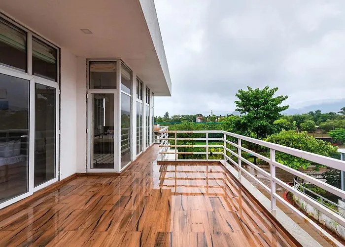 Sierra Skies: Mountain-View Villa with Rooftop Pool & Gym Lonavala